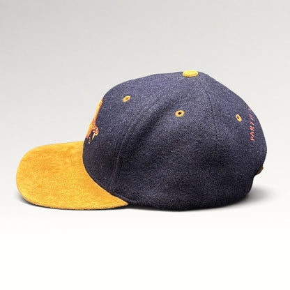 Vintage 1990s Walt Disney Studios navy and tan strapback hat, left side