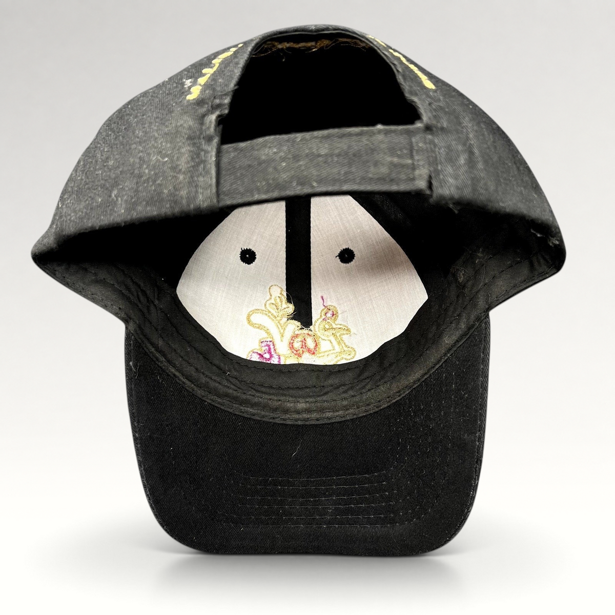 Raree Finds black cotton strapback hat with interior embroidered Love logo and Cielo Malibu Estate Vineyards branding