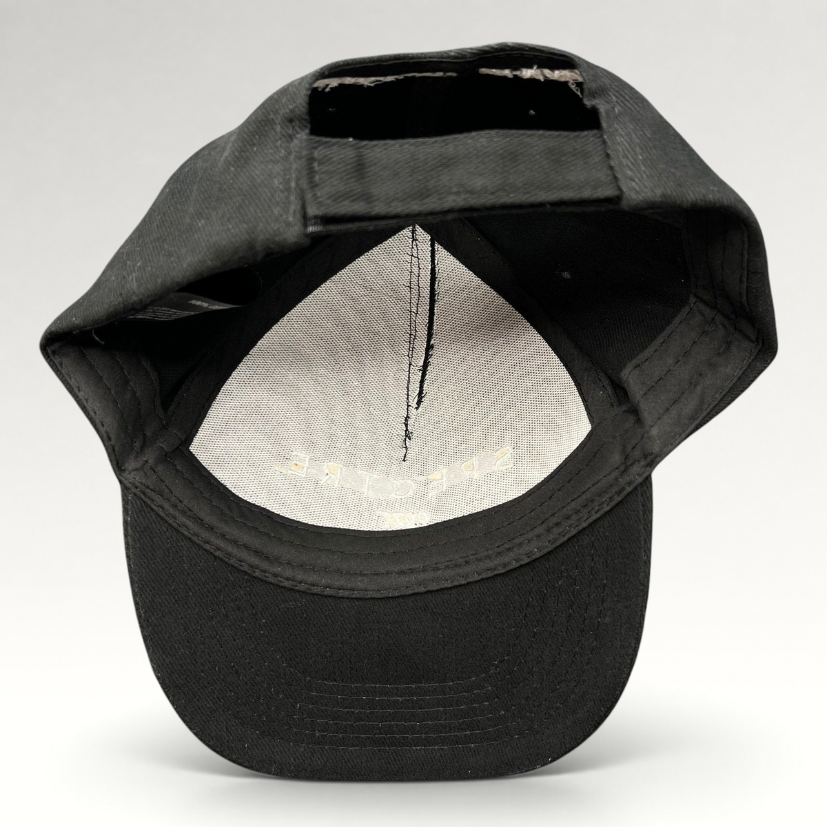 Raree Finds original 2015 Spectre 007 film promo strapback hat in black cotton with interior branding details