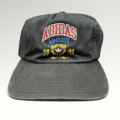 Front view of black Adidas Heritage collegiate spellout strapback