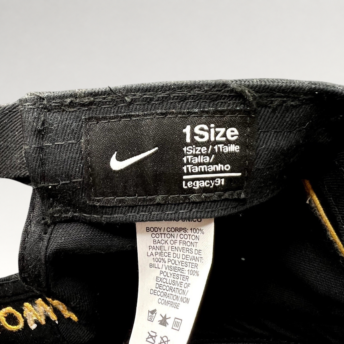 Raree Finds Nike Legacy91 Iowa Hawkeyes hat interior label showing size and material composition details