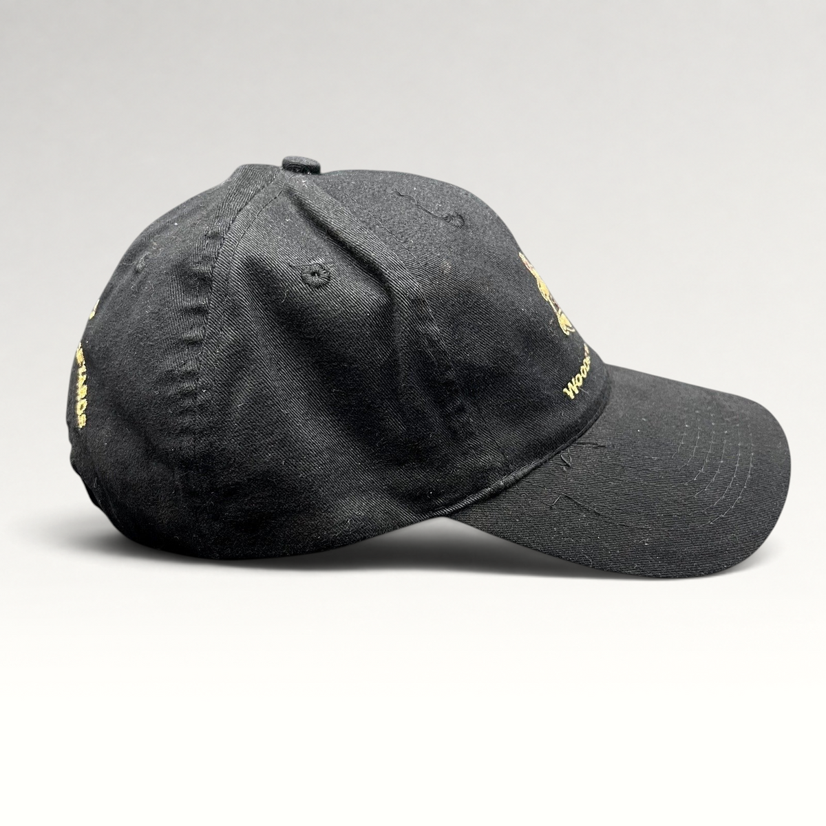 Raree Finds black cotton strapback hat with Woodstock Collection Love embroidery and Cielo Malibu Estate branding.