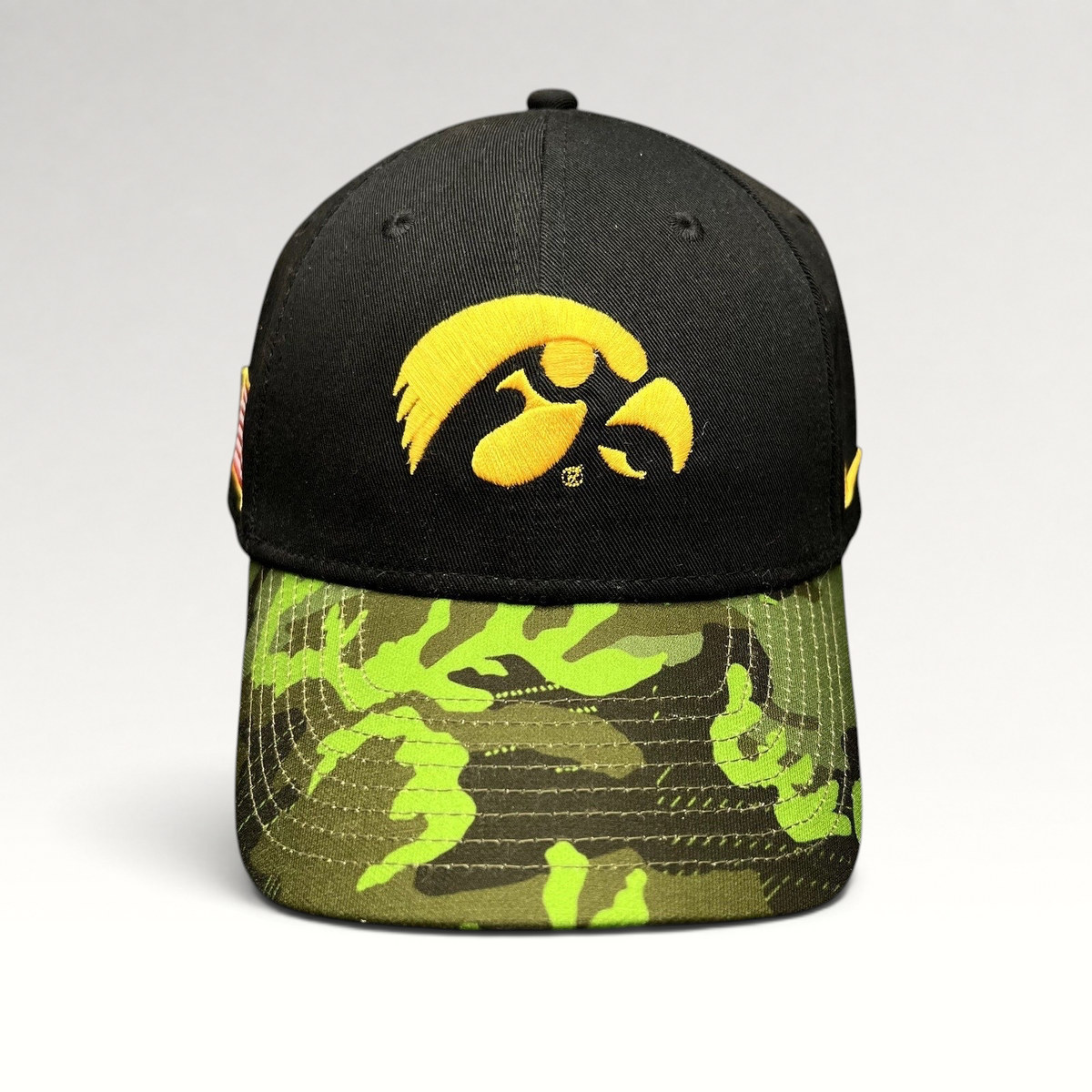 Raree Finds Nike Iowa Hawkeyes Legacy91 strapback hat with black crown, yellow embroidered logo, and camo visor.