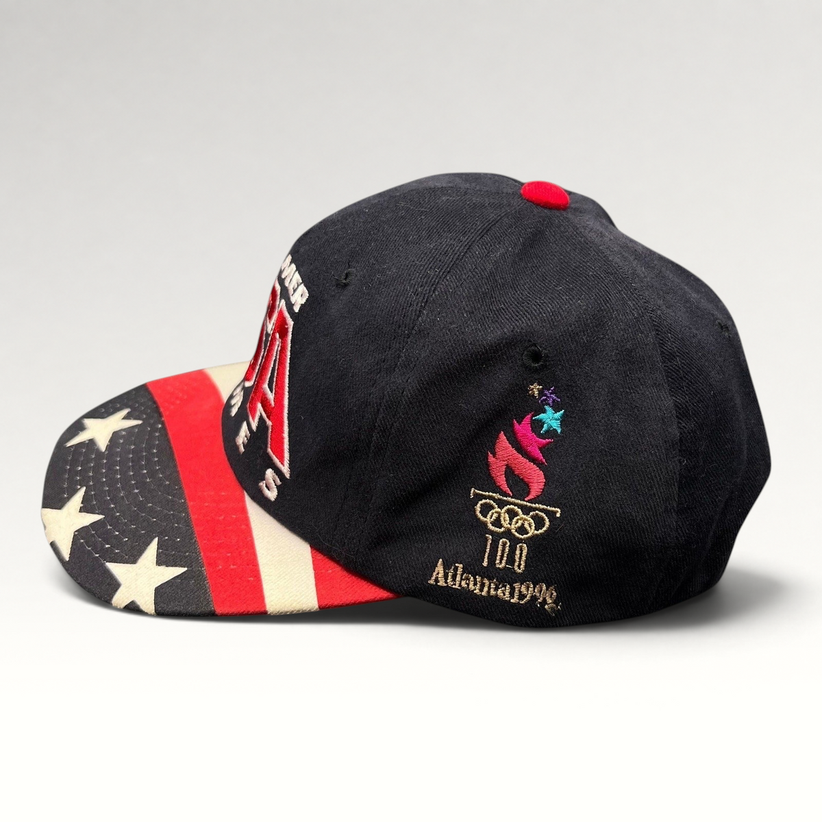 Raree Finds vintage 1996 Atlanta Olympics Starter snapback hat with black crown and American flag print brim