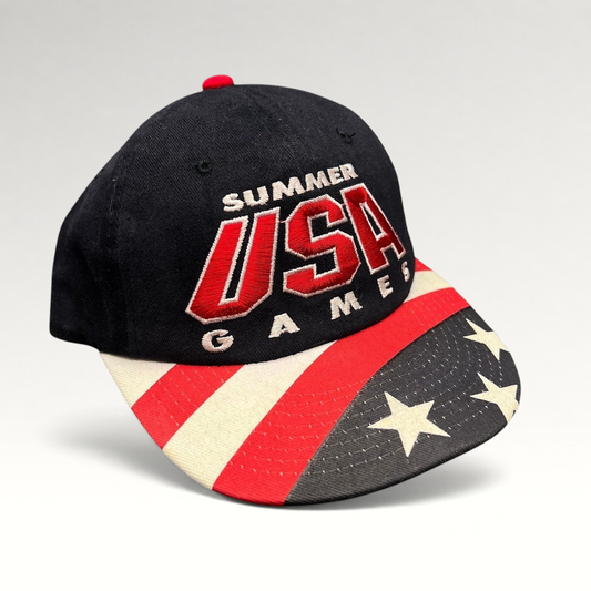 Raree Finds vintage 1996 Atlanta Olympics Starter snapback hat with black crown and American flag print brim.
