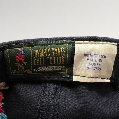 Raree Finds vintage 1996 Atlanta Olympics Starter hat interior label showing 100% cotton and made in Korea details