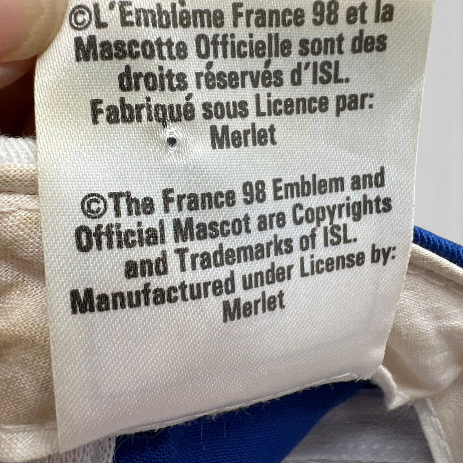 Raree Finds vintage 1998 France World Cup hat interior tag showing official licensing information by Merlet