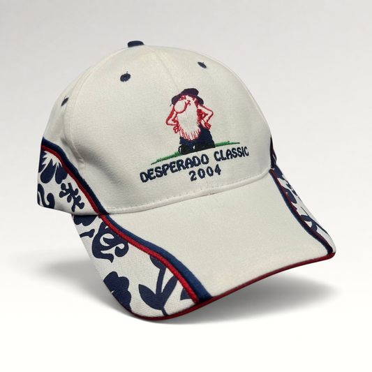 Raree Finds 2004 Desperado Golf Classic white cotton strapback hat with western embroidered logo and patterned sides