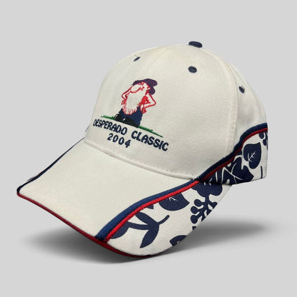 Raree Finds 2004 Desperado Golf Classic cotton strapback hat in white with navy and red western graphic embroidery
