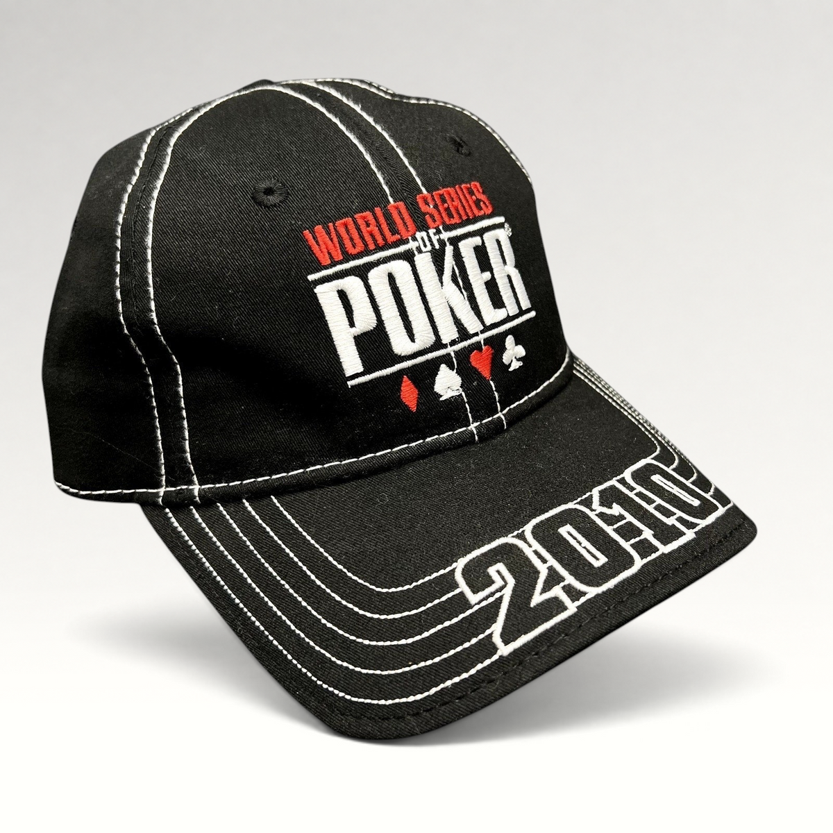 Raree Finds 2010 World Series of Poker black flexfit hat with white contrast stitching and embroidered logo.
