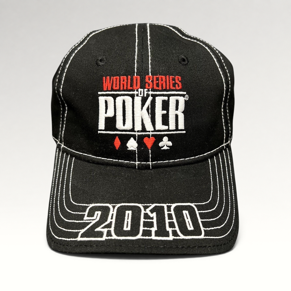 Raree Finds 2010 World Series of Poker black flexfit hat with white embroidered logo and card suit graphics