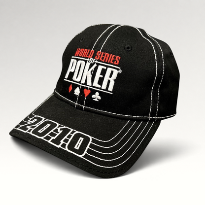 Raree Finds black 2010 World Series of Poker flexfit hat with embroidered logo, card suits, and brim stitching.