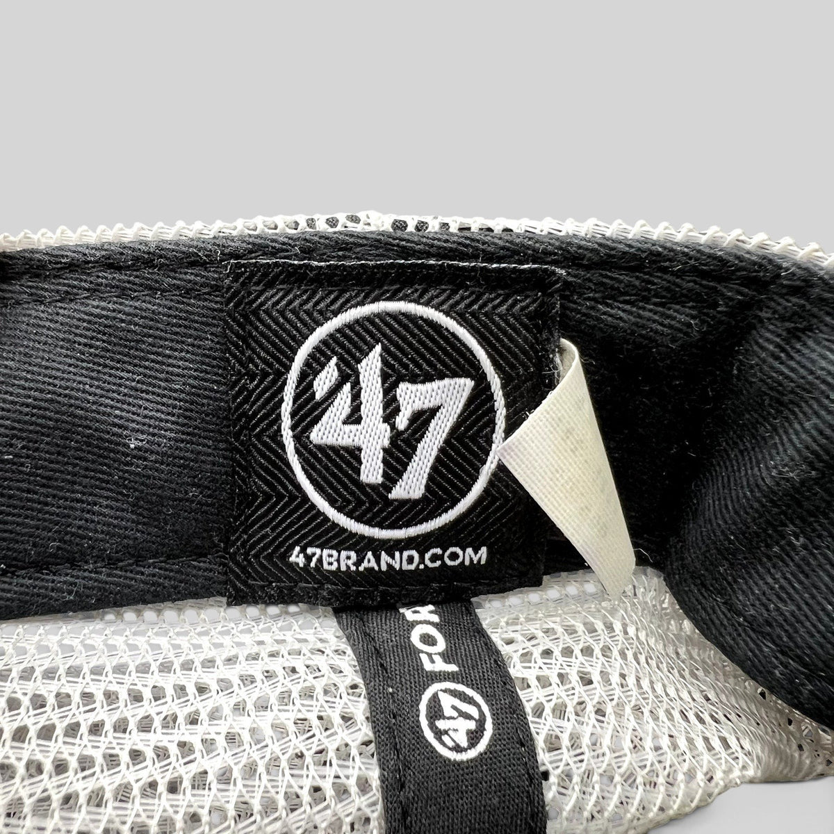 Raree Finds 47 Brand trucker hat interior label with white mesh back and black fabric details
