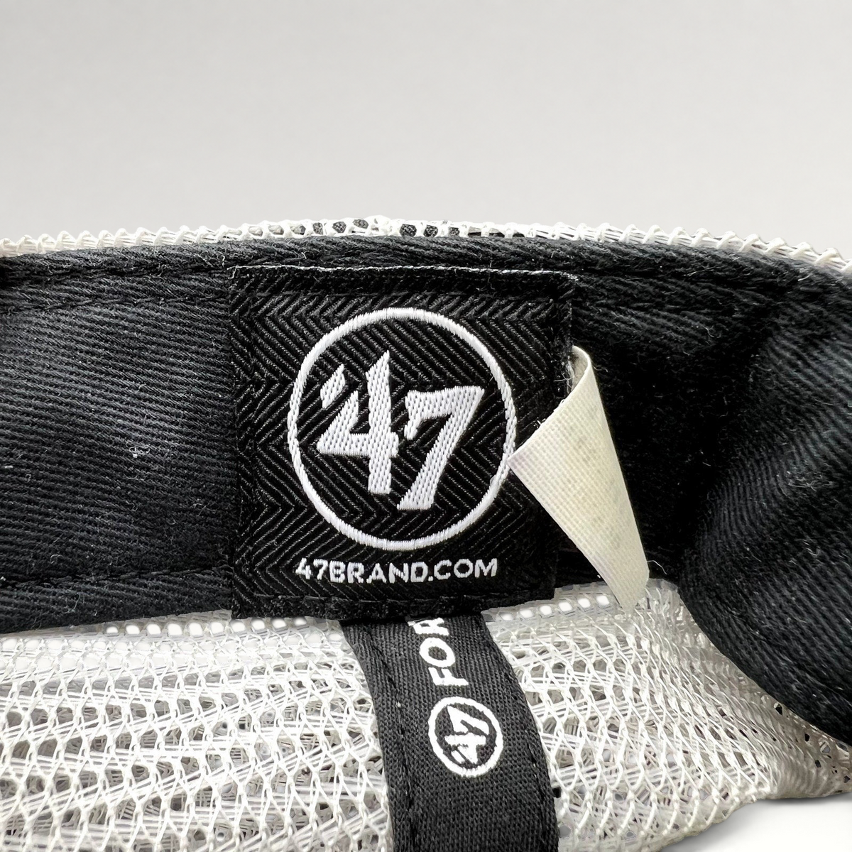 Raree Finds 47 Brand trucker hat interior label with white mesh back and black fabric details
