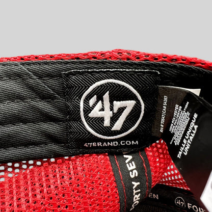 Raree Finds ’47 Brand trucker hat interior showing the black woven logo label and red mesh construction