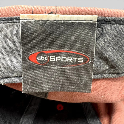 Raree Finds vintage ABC Sports hat interior tag with embroidered logo on a black fabric label inside the cap