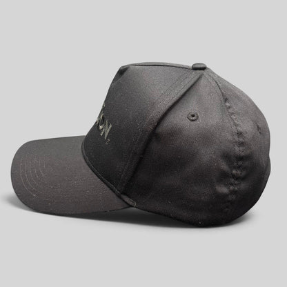 Raree Finds black Activision snapback hat with tonal embroidered logo, side profile view of cotton blend cap.