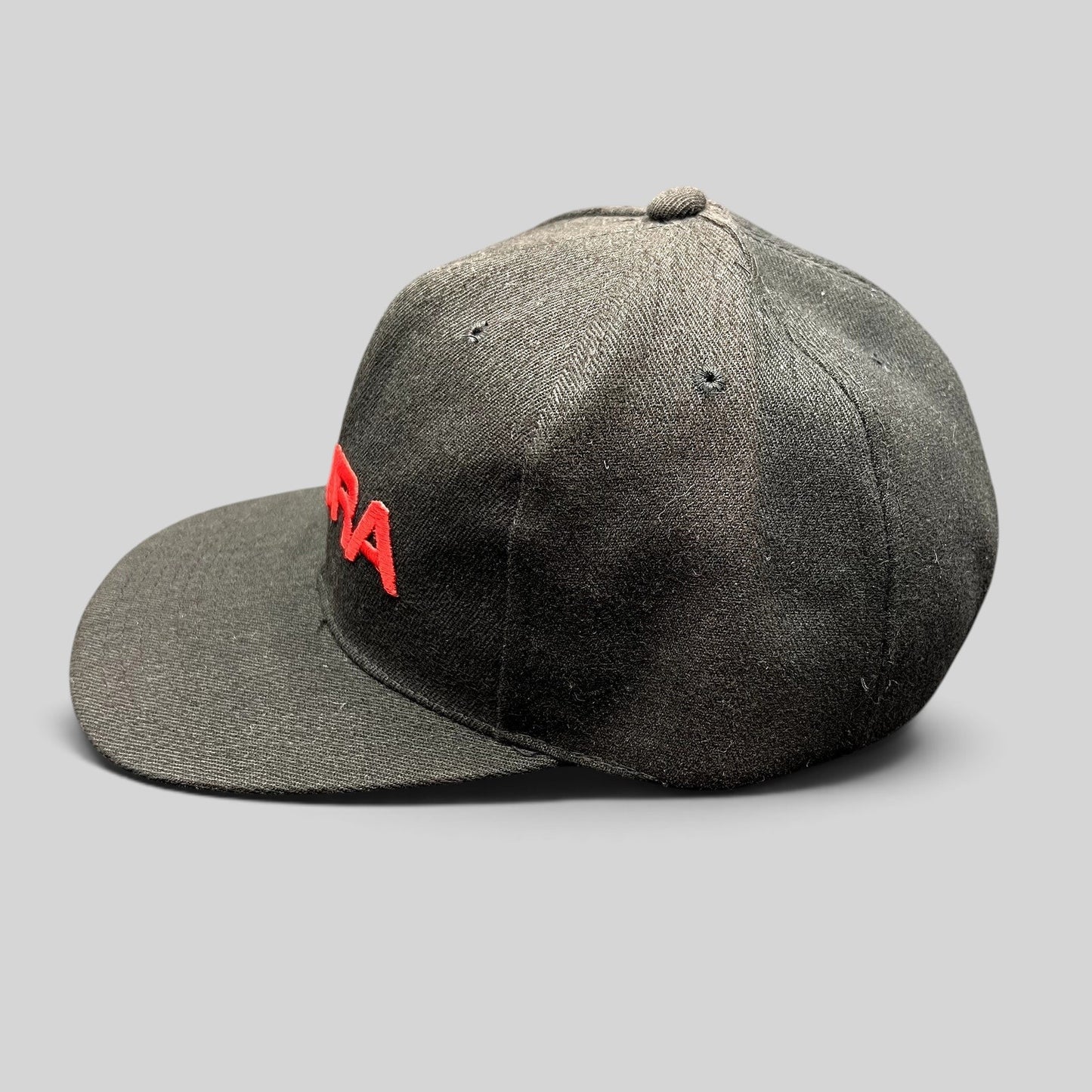 Raree Finds black Acura snapback hat with bold raised red embroidery and a structured flat brim design.