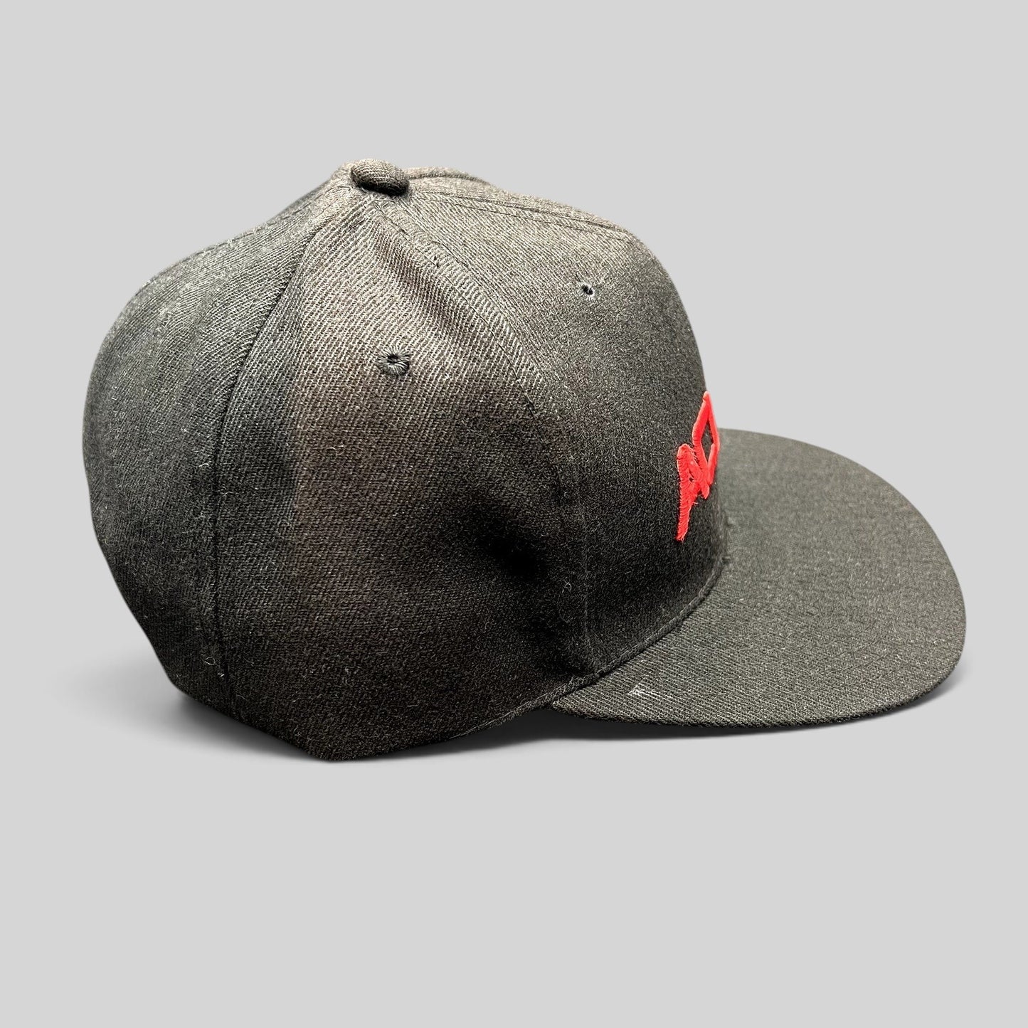 Raree Finds black Acura snapback hat with raised red embroidery on a structured six-panel flat brim cap