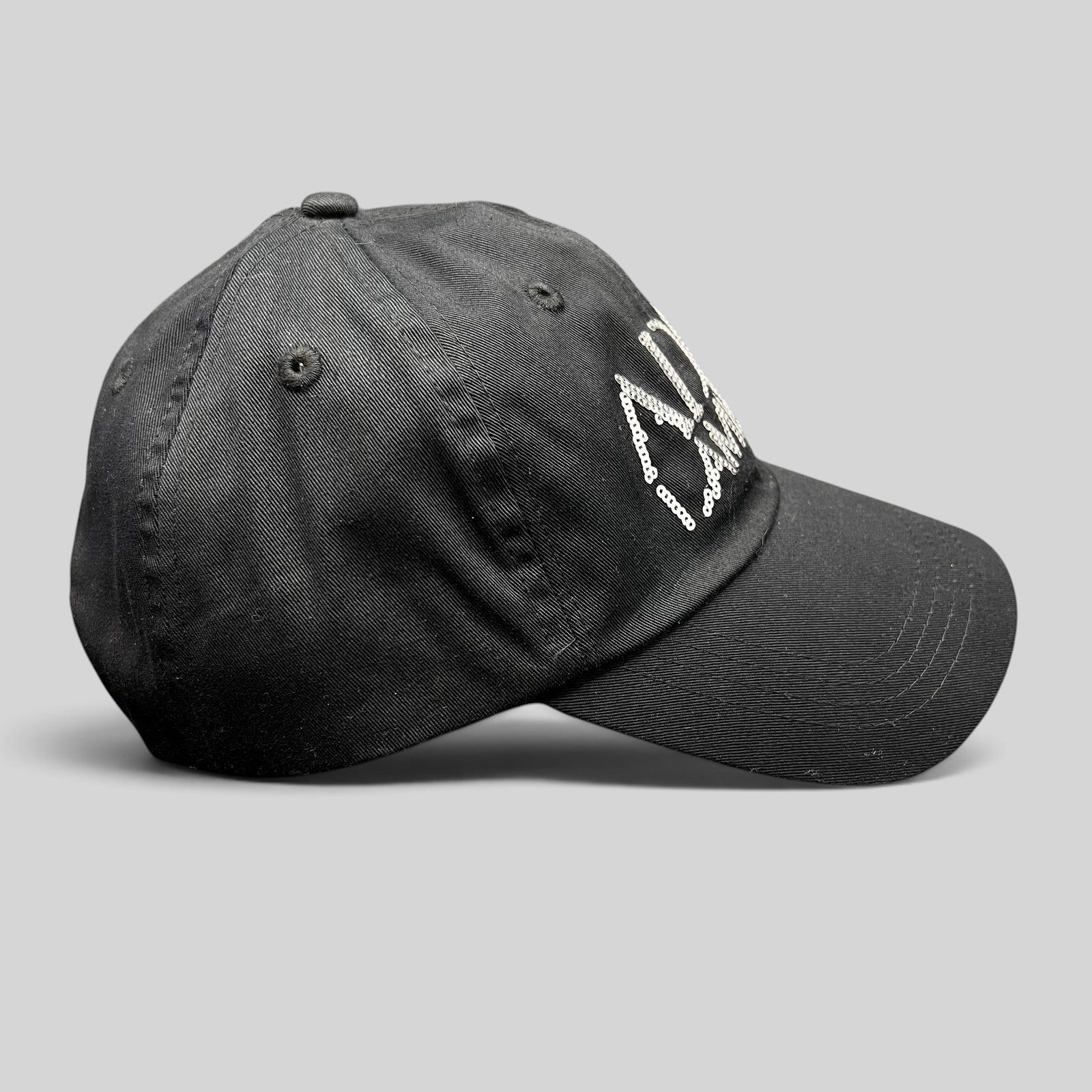 Raree Finds black cotton snapback hat featuring a silver sequin Adam Lambert logo on the front panel