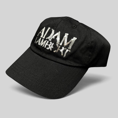 Raree Finds black cotton snapback hat with silver sequin Adam Lambert logo, featuring a classic six-panel design.