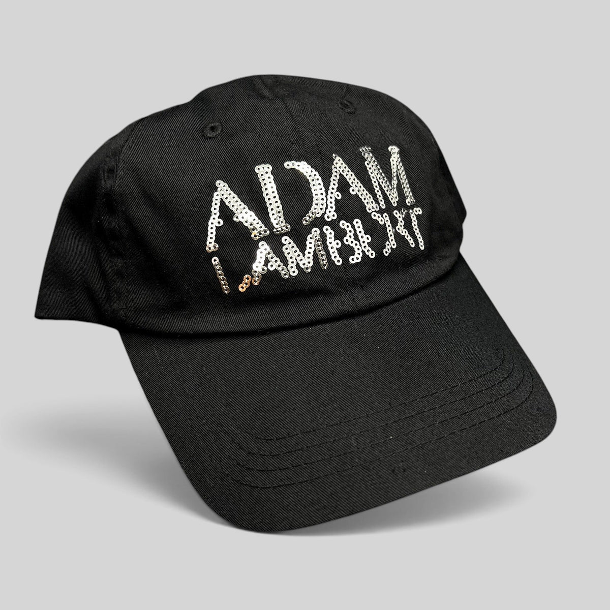 Raree Finds black cotton snapback hat featuring a silver sequin Adam Lambert logo on the front