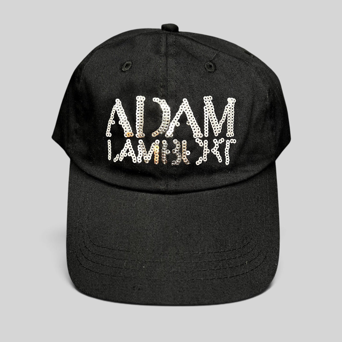 Raree Finds black cotton snapback hat featuring an Adam Lambert logo in silver and gold sequins.