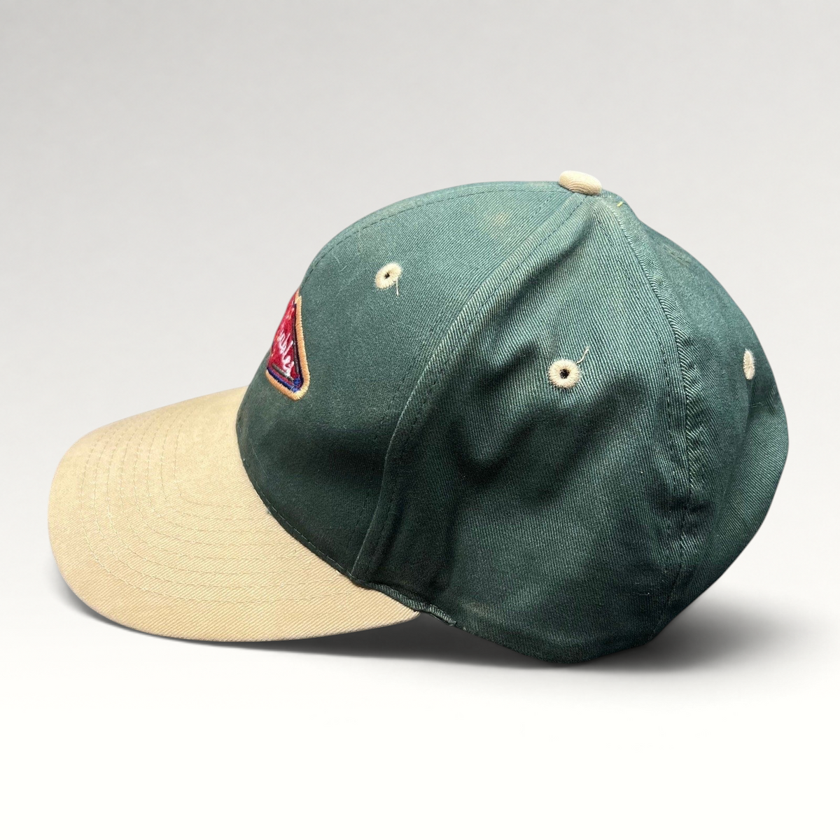 Raree Finds vintage Ahead Headgear two-tone golf cap in forest green and khaki with Green Gables Pub patch