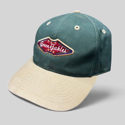 Raree Finds vintage Ahead Headgear strapback hat with a forest green crown, khaki brim, and Green Gables 1929 patch.