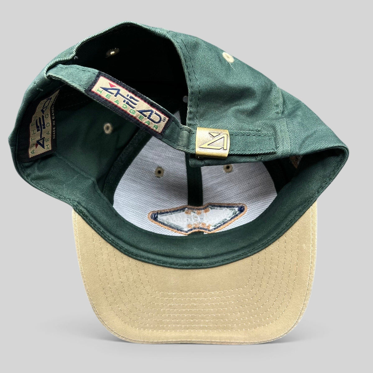 Raree Finds vintage Ahead Headgear strapback hat in forest green and khaki with an embroidered Green Gables Pub patch