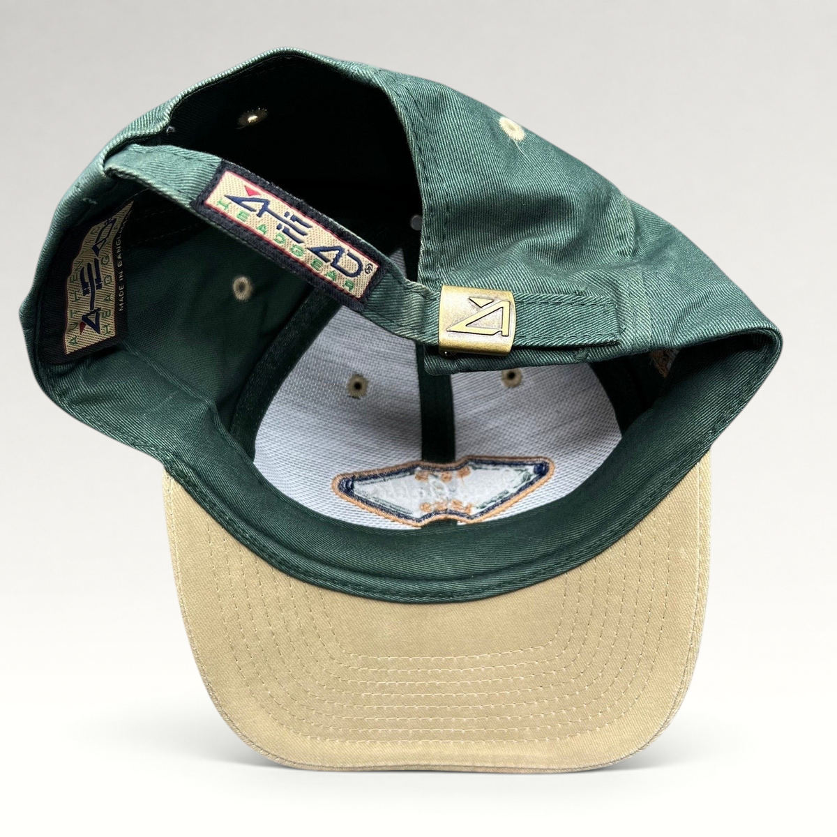 Raree Finds vintage Ahead Headgear strapback hat in forest green and khaki with an embroidered Green Gables Pub patch