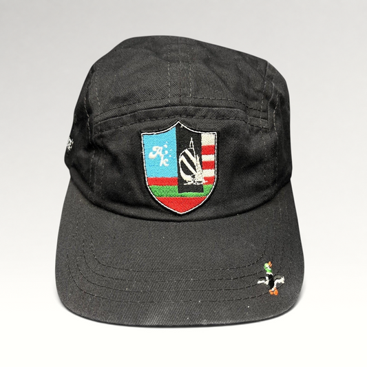 Raree Finds Akomplice Clothing black cotton strapback cap with a colorful embroidered crest patch and duck brim detail