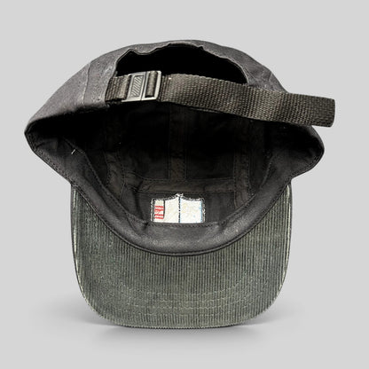 Raree Finds Akomplice Clothing black cotton strapback hat showing the interior lining and adjustable nylon strap