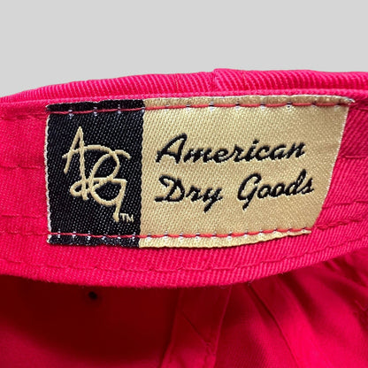 Raree Finds vintage American Dry Goods brand label stitched inside a bright red cotton strapback hat