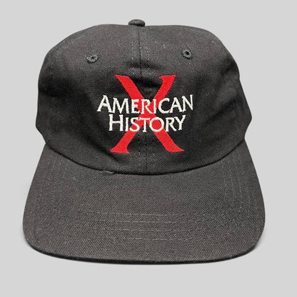 Raree Finds vintage 1998 American History X promotional black cotton snapback hat with red X and white embroidery.