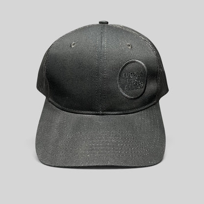 Raree Finds American Music Awards blackout trucker hat with tonal black embroidered logo and mesh back