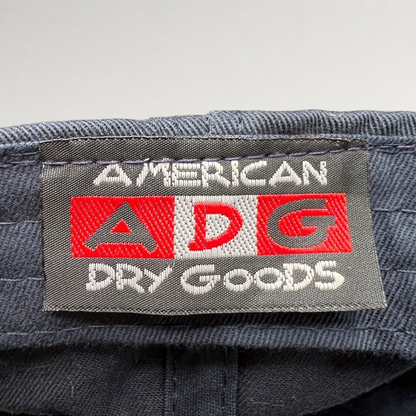 Raree Finds American Needle ADG clothing label stitched on a black cotton hat interior