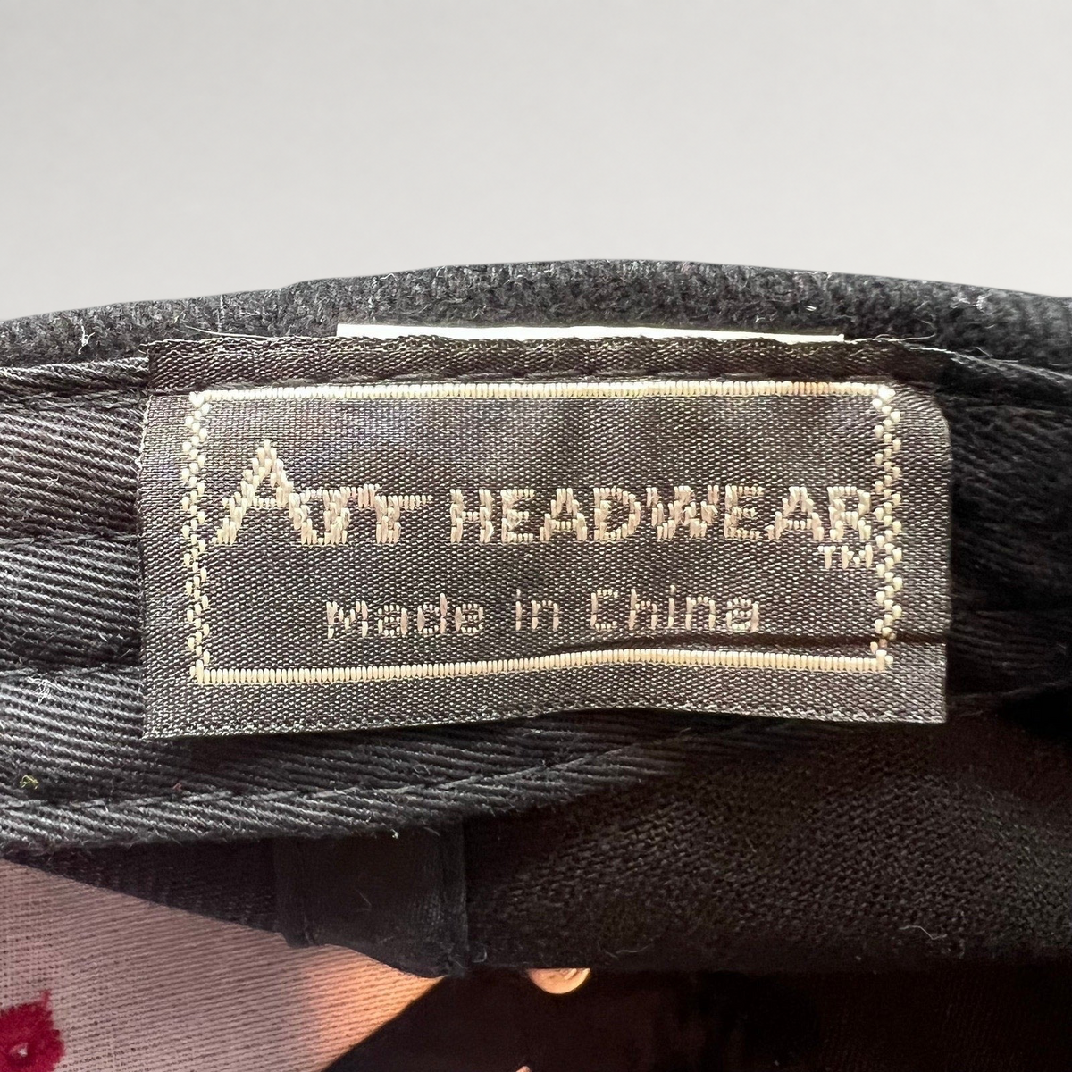 Raree Finds vintage Amy Headwear label inside a black cotton blend snapback cap