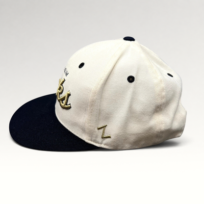 Raree Finds Anaheim Ducks Zephyr snapback hat with white crown, black brim, and gold script embroidery