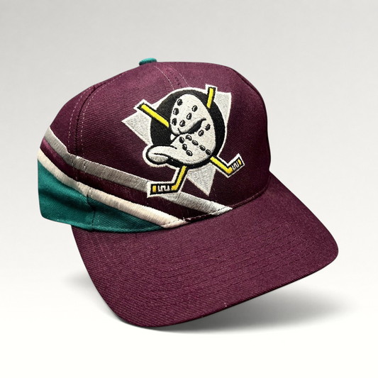 Raree Finds vintage Anaheim Mighty Ducks Apex One snapback hat featuring a teal, silver, and white wave design.