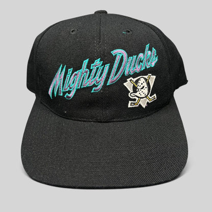 Raree Finds vintage Anaheim Mighty Ducks snapback hat in black with teal and purple script logo and Wild Wing emblem.