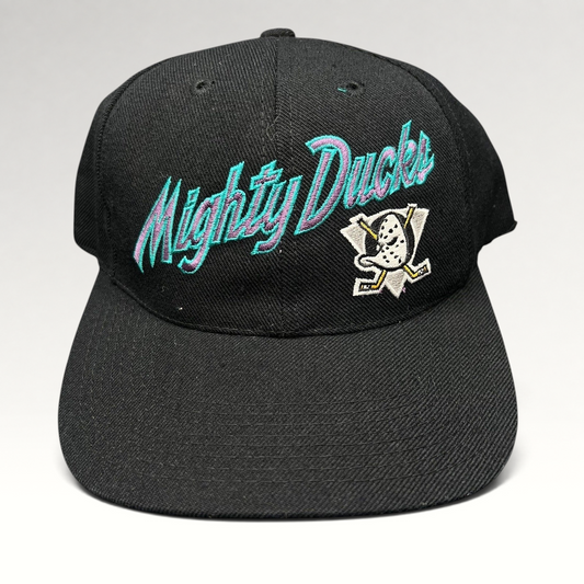 Raree Finds vintage Anaheim Mighty Ducks snapback hat in black with teal and purple script logo and Wild Wing emblem.