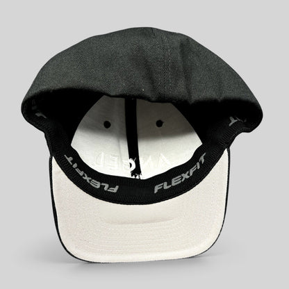 Raree Finds black Angel Studios Flexfit cap with white interior lining and branded sweatband, viewed from underneath.