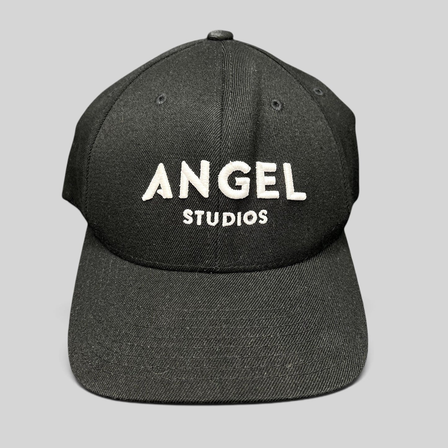 Raree Finds black Flexfit cap with white embroidered Angel Studios logo and structured curved brim