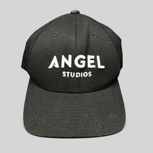 Raree Finds black Flexfit cap with white embroidered Angel Studios logo and structured curved brim