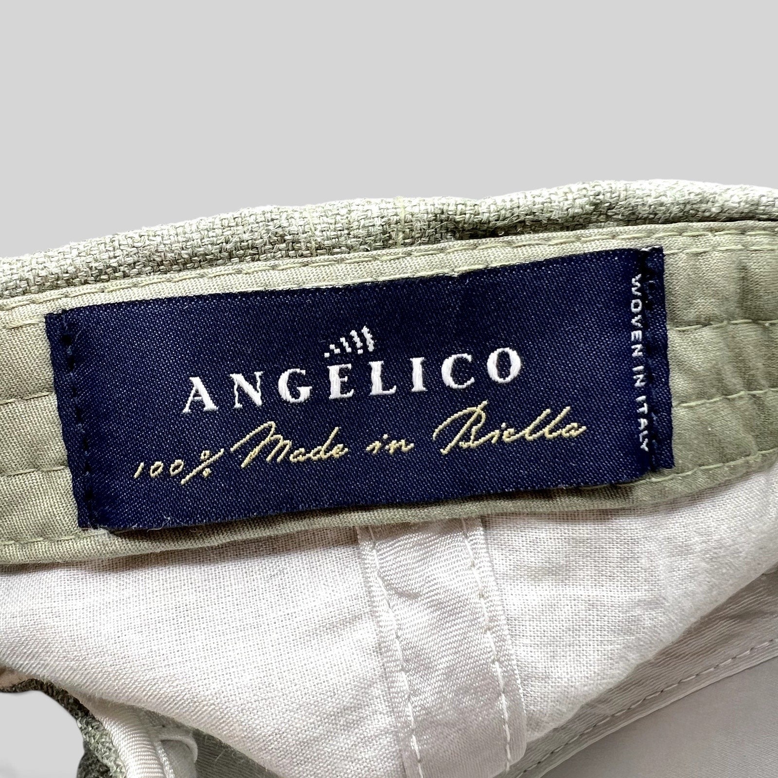 Raree Finds Angelico sage green linen cap interior label showing 100% Made in Biella Italian craftsmanship