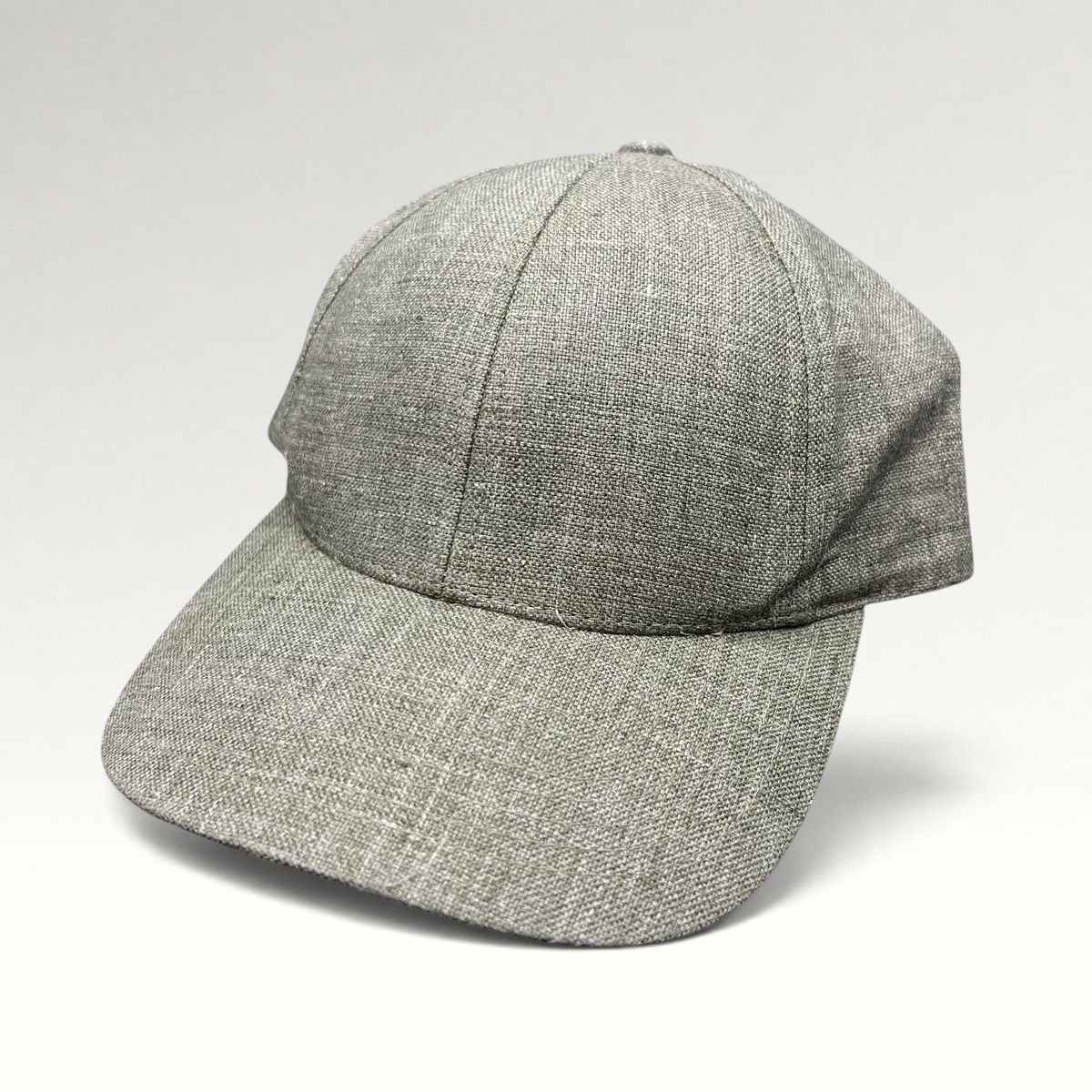 Raree Finds Angelico sage green unstructured strapback cap made from premium Italian woven linen fabric