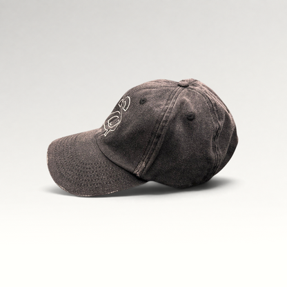 Raree Finds Ann Andelman distressed black denim baseball cap with white embroidered monogram logo and frayed brim