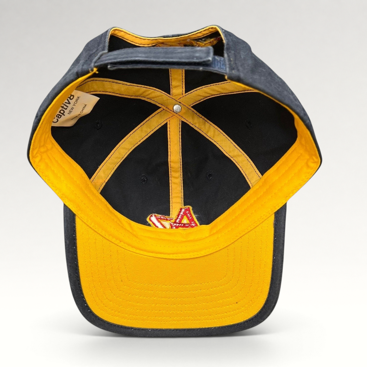 Raree Finds Arizona Iced Tea black strapback cap interior view showing yellow lining and AZ logo embroidery
