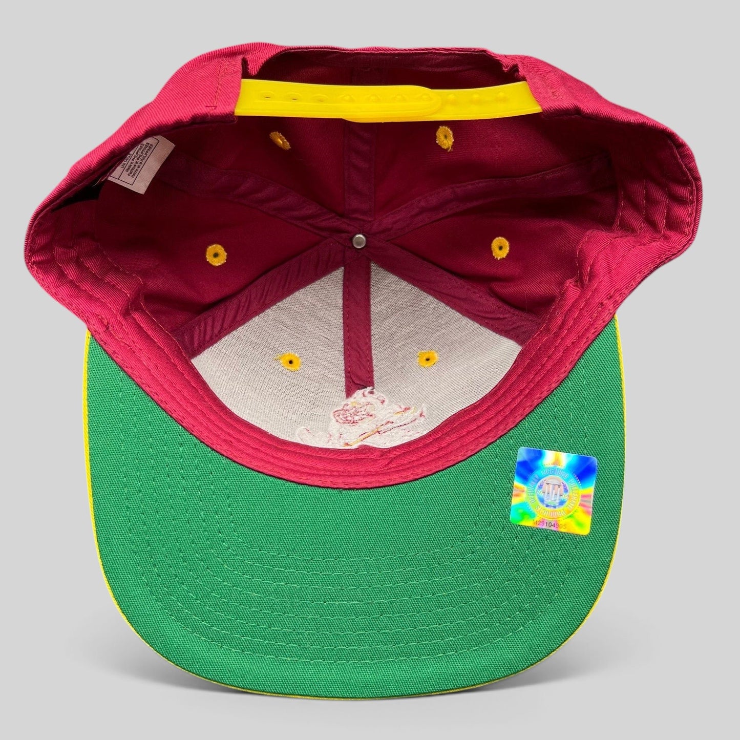 Raree Finds vintage Arizona State Sun Devils snapback interior showing green undervisor, yellow snap, and NCAA tag